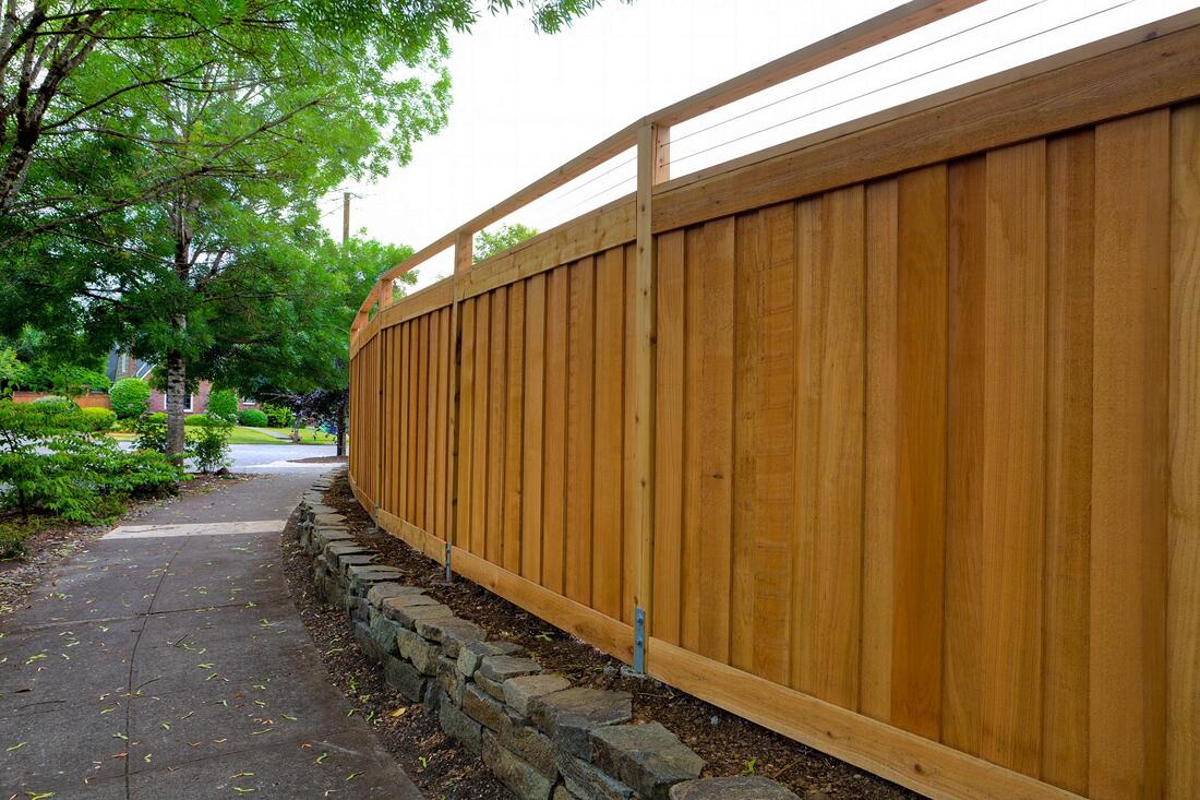 a tall wooden fence